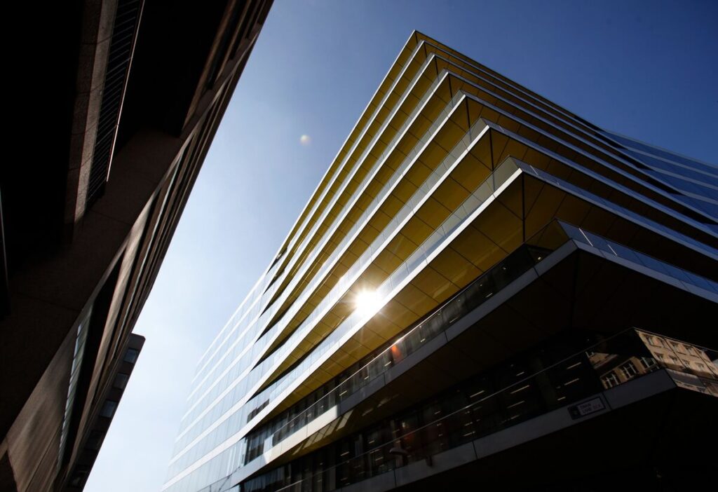 Man Group Goes All-In on ETFs With Hedge-Fund Trades for Masses